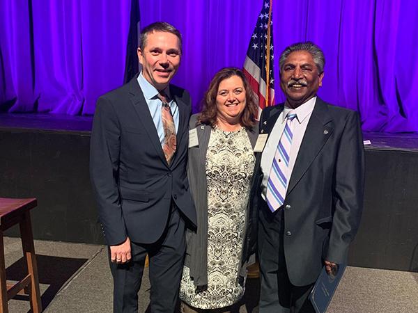 Dr. Sudhakar Jamkhandi (left), Bluefield State College Professor of English and Director of the Office of International Initiatives, and Dr. Angela Lambert (center), Dean/Bluefield State College School of the School of Nursing and Allied Health, are pictured with Matt Turner, Executive Vice Chancellor for Administration/WV Higher Education Policy Commission during the recent Public Service Recognition Week ceremony in Charleston.  Dr. Jamkhandi received a certificate of recognition for his 35 years of servi